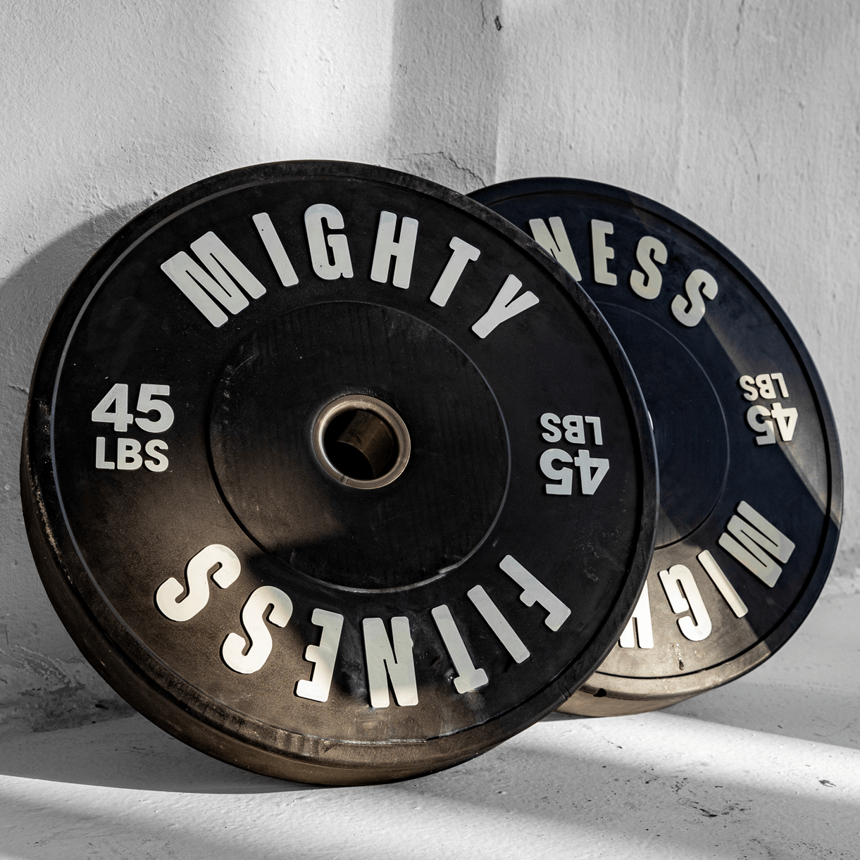 Mighty Fitness Bumper Plate rubber olympic 2 inch. 45 lb